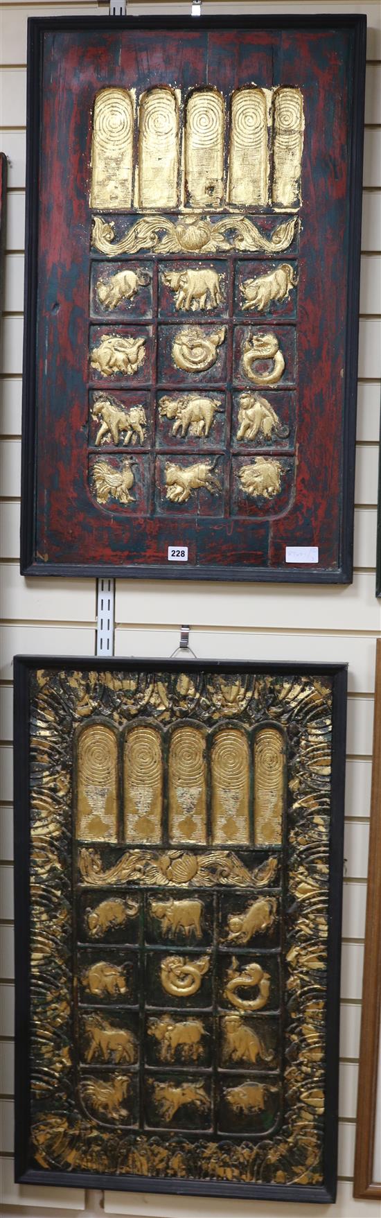 A pair of polychrome and giltwood astrological panels width 53cm height 88cm